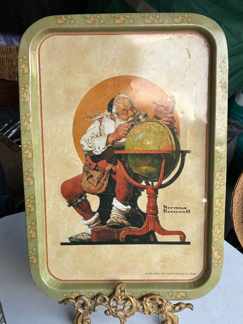 Norman Rockwell Metal tin Santa Checking his list